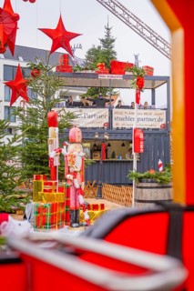 View of Christmas decoration with big red stars and gifts, Sindelfingen, Böblingen district,