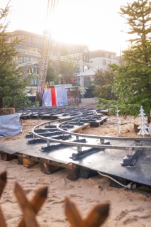 Curvy railroad tracks on Christmas market with sunlight in the background, Sindelfingen, Böblingen
