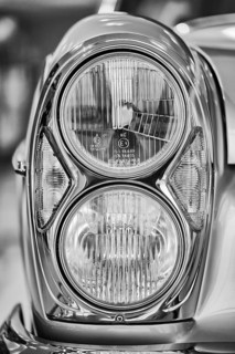 Detailed view, black and white photography, twin headlights for various classic Mercedes-Benz