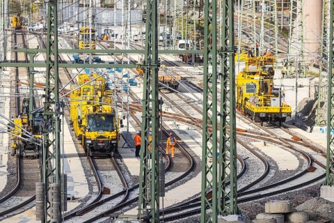 Rail construction crews with a work train. New parking station in UntertÃ¼rkheim. As part of
