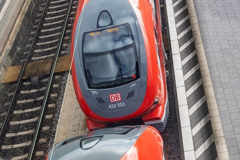 Ulm main station with Deutsche Bahn AG regional train on the platform. Ulm, Baden-WÃ¼rttemberg,