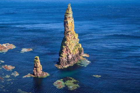 Duncansby Stacks pinnacles in the sea at Duncansby Head, John o' Groats on the east coast of