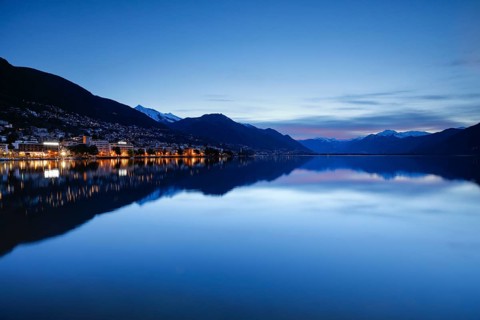 Locarno lake basin at dawn, snow-covered Pizzo Vogorno in the background, Canton of Tessin,