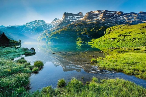 Engstlensee near Engstlenalp with GroÃŸ Wendenstock, Reissend Nollen and Titlis in the background,