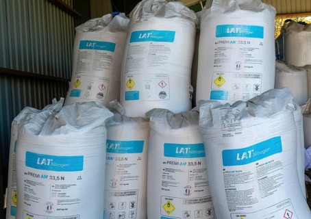 MYPREMIAN ammonium nitrate LAR nitrogen fertiliser bags stored in farm barn, Suffolk, England, UK