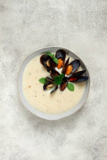 Chowder cream soup with mussels, American cuisine, homemade, no people