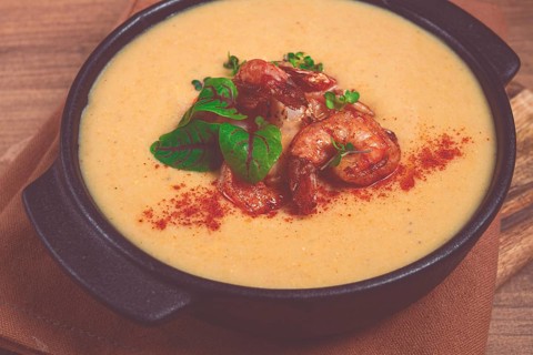Pumpkin cream soup with shrimp, herbs and spices, homemade, no people