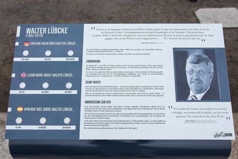 Information board about Walter LÃ¼bcke on Walter LÃ¼bcke Platz in front of the Konrad Adenauer