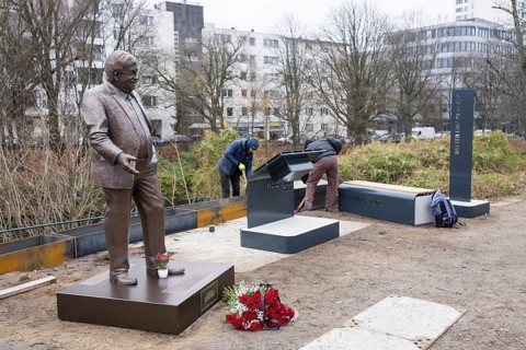 Workers erect the Walter LÃ¼bcke Square in front of the Konrad Adenauer Haus, the party