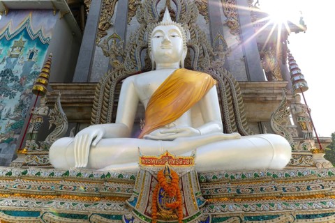 Buddha statue with tunic, Bhumispara mudra, Buddha Gautama at the moment of enlightenment, at the