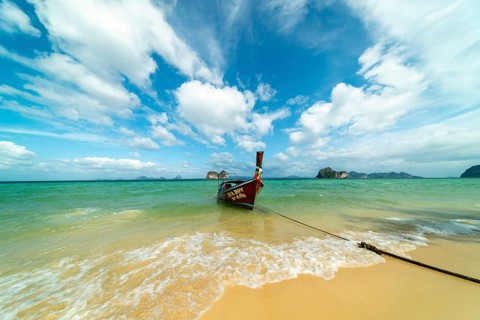 Longtail boat on the beach, Koh Ngai island, Andaman Sea, Satun province, southern Thailand,