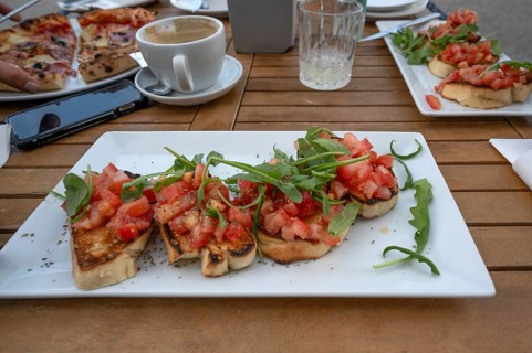 Bruschetta and pizza served in a garden café, Ahrenshoop, DarÃŸ, Mecklenburg-Vorpommern, Germany