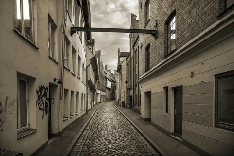 Alley of LÃ¼beck's old town with historic houses, Sepia, Seventh QuerstraÃŸe, Hanseatic City of