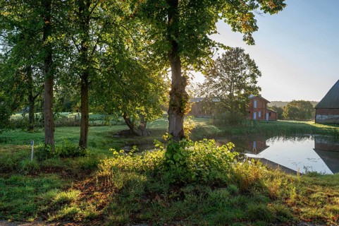 Manor with historic stables and pond, from 1923, Gut Othenstorf, Mecklenburg-Western Pomerania,