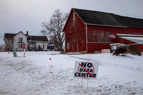 Saline, Michigan USA - 1 December 2025 - A sign on a rural Michigan road opposes a planned $7