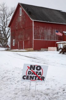 Saline, Michigan USA - 1 December 2025 - A sign on a rural Michigan road opposes a planned $7
