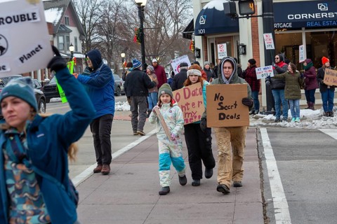 Saline, Michigan USA - 1 December 2025 - Rural Michigan residents rally against the $7 billion