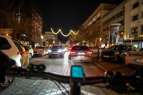 Cycling in the city, in the dark, in the evening, inner-city road, bicycle road, two-wheeler