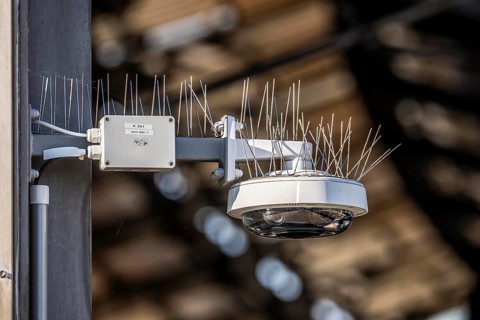 Observation camera, video surveillance at FriedrichstraÃŸe station, on the platform, with wire