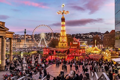 Sunset at Stuttgart's Christmas market in the Schlossplatz area. With around 3.5 million visitors,