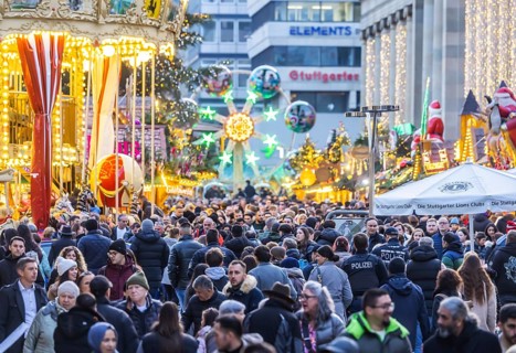 Busy shopping street in Stuttgart. Police patrol in the midst of the crowds. On the first weekend