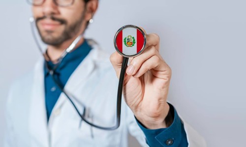 Doctor holding stethoscope with Peru flag. Peru health and care concept. Peru flag on stethoscope