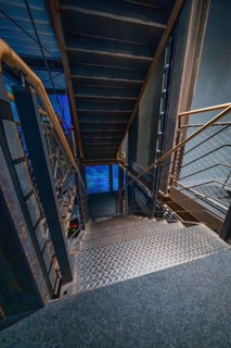 Stairs with industrial design in blue light at night, Amazonia exhibition, Gasometer, Pforzheim,