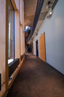 Modern interior with wooden paneling and elegant corridor, Amazonia exhibition, Gasometer,