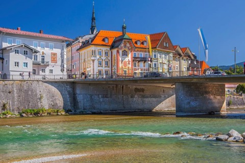 Isar bank with Isar bridge and Marienstift or Krugledererhaus, Bad Tölz. Isartal, Upper Bavaria,