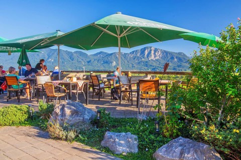 Restaurant terrace from Hofcafe zum Stern in the district of Zell, GroÃŸweil, Loisachtal, Das Blaue