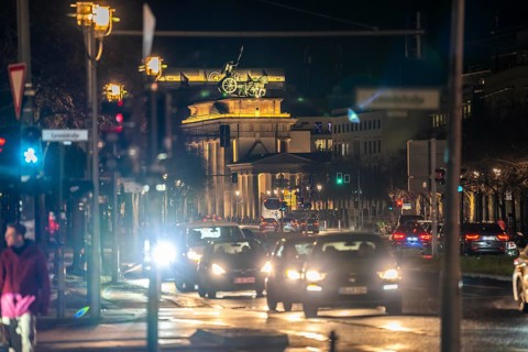 Evening traffic on EbertstraÃŸe, on 18th March Square, Brandenburg Gate, Berlin, Germany