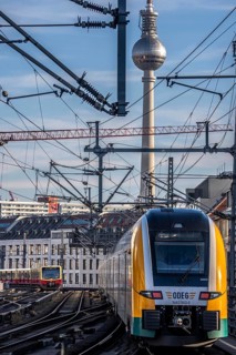 Railway line in Berlin, east of FriedrichstraÃŸe station, looking east, Berlin TV Tower, ODEG Zug