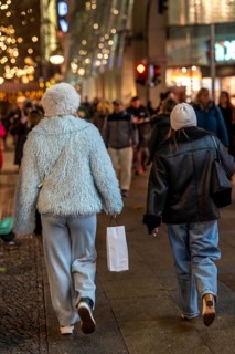 Passaten, shopping in the evening on TauentzienstraÃŸe in Berlin, Germany