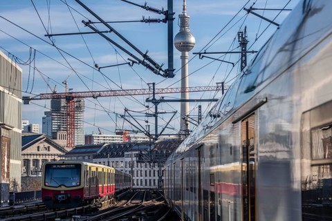Railway line in Berlin, east of FriedrichstraÃŸe station, looking east, Berlin TV Tower, trains on