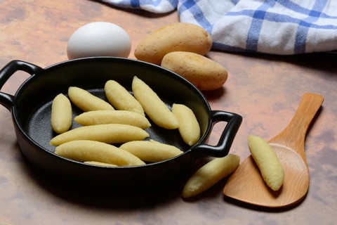 Raw Schupfnudeln in pan, type of pasta, Germany