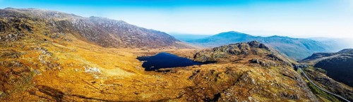 Autumn colours over Llyn Cwmffynnon and Miner's Track, Start Point, road A4086 from a drone,