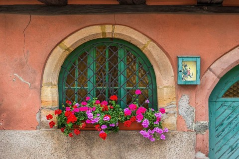 Window decorated with flowers in Ellsass, France