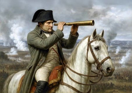The French Emperor Napoleon Bonaparte on his horse looks through his telescope at the troops of his