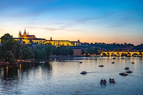 Sunset over the Vltava River, Charles Bridge and Prague Castle in Prague, Czech Republic