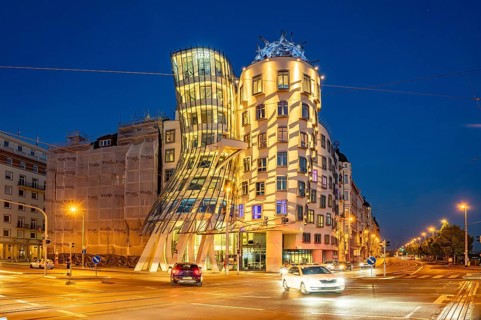 The Dancing House of architects Vlado MiluniÄ‡ and Frank Gehry at dusk, Prague, Czech Republic