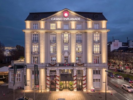 Aerial view of the illuminated Casino Esplanade (Spielbank Hamburg) at Blue Hour on Stephansplatz,