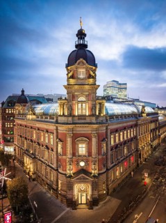 Aerial view of Old Oberpostdirektion am Stephansplatz during the blue hour with clouds in the