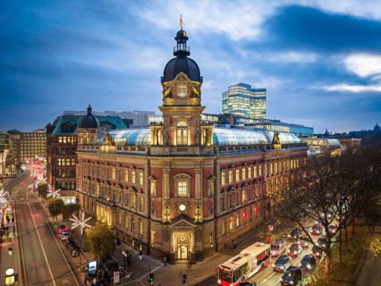 Aerial view of Old Oberpostdirektion am Stephansplatz during the blue hour with clouds in the