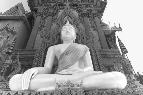 Buddha statue with tunic, Bhumispara mudra, Buddha Gautama at the moment of enlightenment, at the