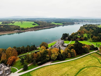 Autumn over Plas Newydd House from a drone, Gardens and Parkland, Llanfairpwllgwyngyll, Anglesey,