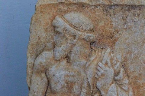 Marble relief depicting standing man, c. 460 BC, ancient stone relief with bearded man in