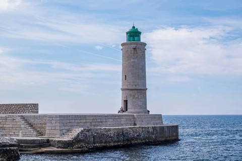 Lighthouse at the entrance of Cassis, lighthouse in the port of Cassis, Provence,
