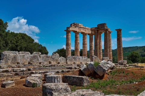 Majestic ancient ruins of a temple with numerous columns and scattered stones, Ancient Sanctuary of