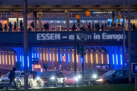The main train station in Essen, blue-lit underpass, bus station, am Europaplatz, public transport