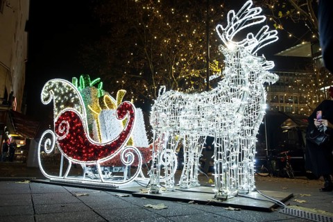 A light installation in front of the Christmas lights on KurfÃ¼rstendamm on 25.11.2025. The